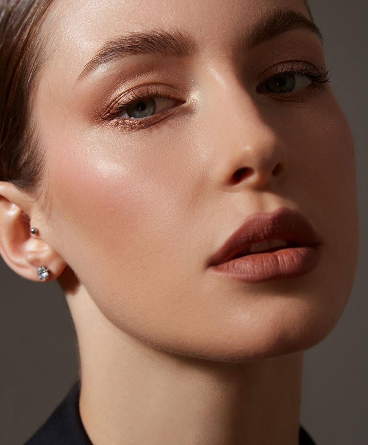 Close-up of a woman with radiant skin.