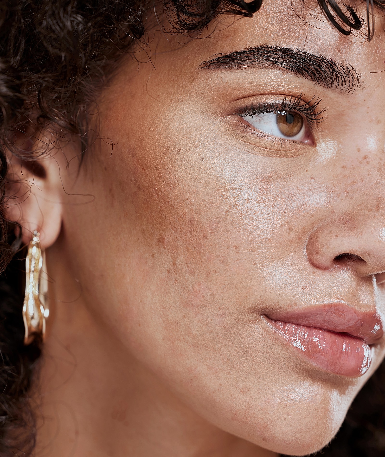 Close-up of woman’s face with closed eyes.